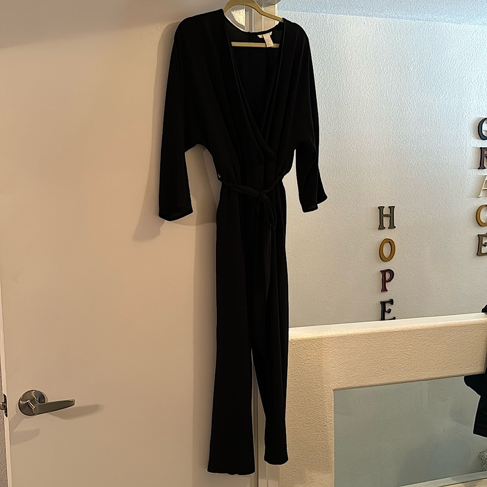 H&M Never been worn black long sleeve jumpsuit.